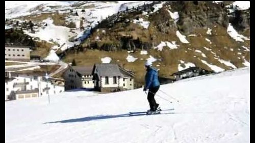 Marjolein skiing down Passo Rolle II