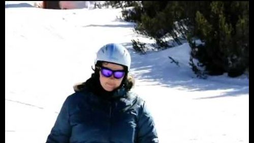 Marjolein skiing down Passo Rolle