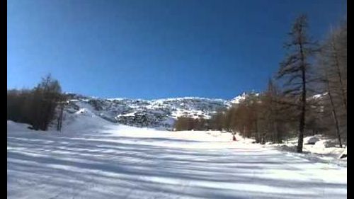 Angharad skiing red run in Saas Fee