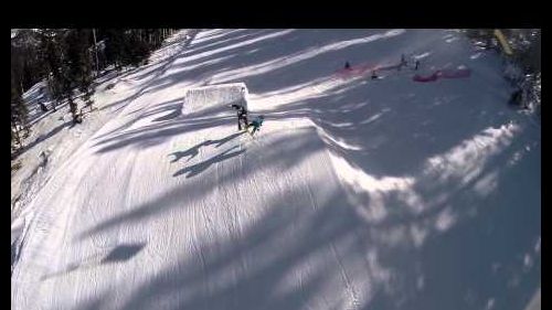Insane snowboard fall. never stand in the landing of a ski jump