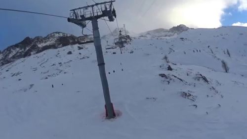 Amateur  Ski couple on a Professional Ski slope(Chamonix Mont Blac France)