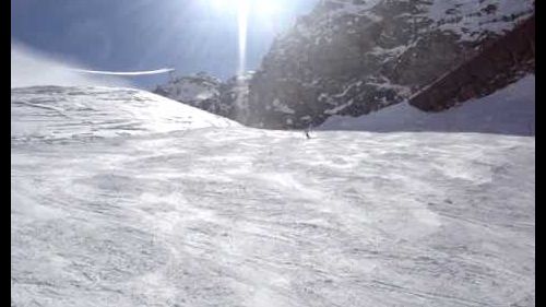 Lynn skiing in sunny saas fee