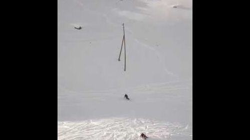 Chris Laprun snowboarding off-piste in Saas-Fee
