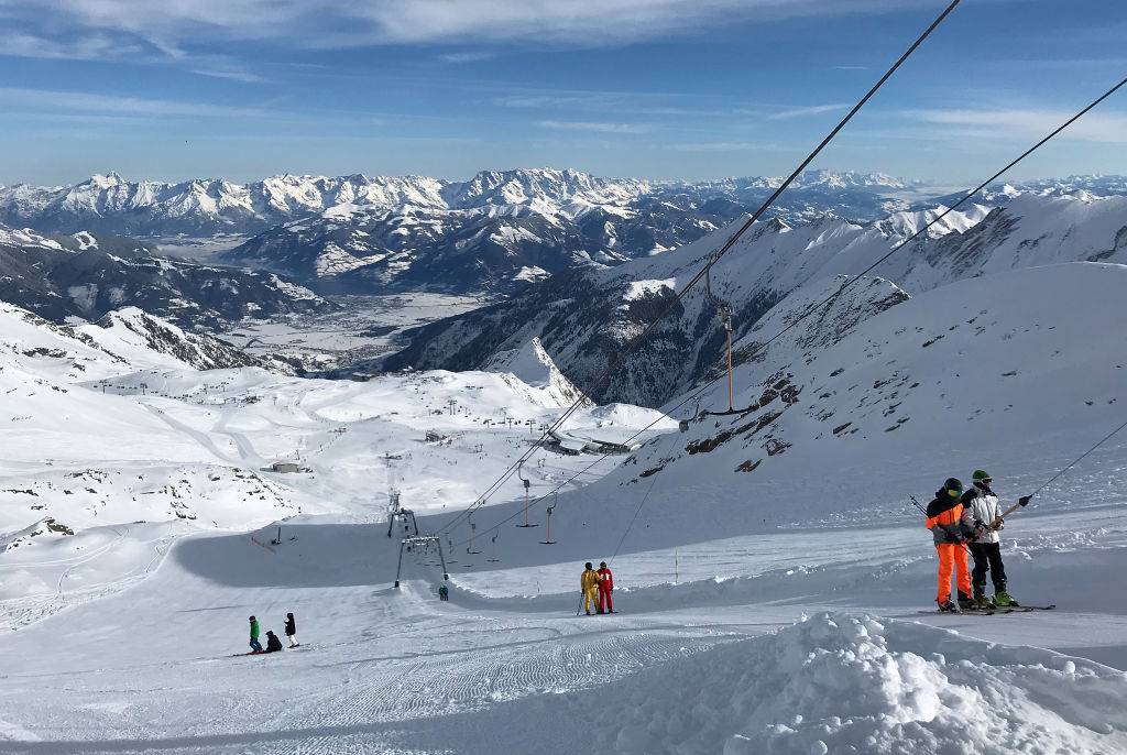 Visitors ride a ski lift up a glacier on Kitzsteinhorn mountain, in Kaprun