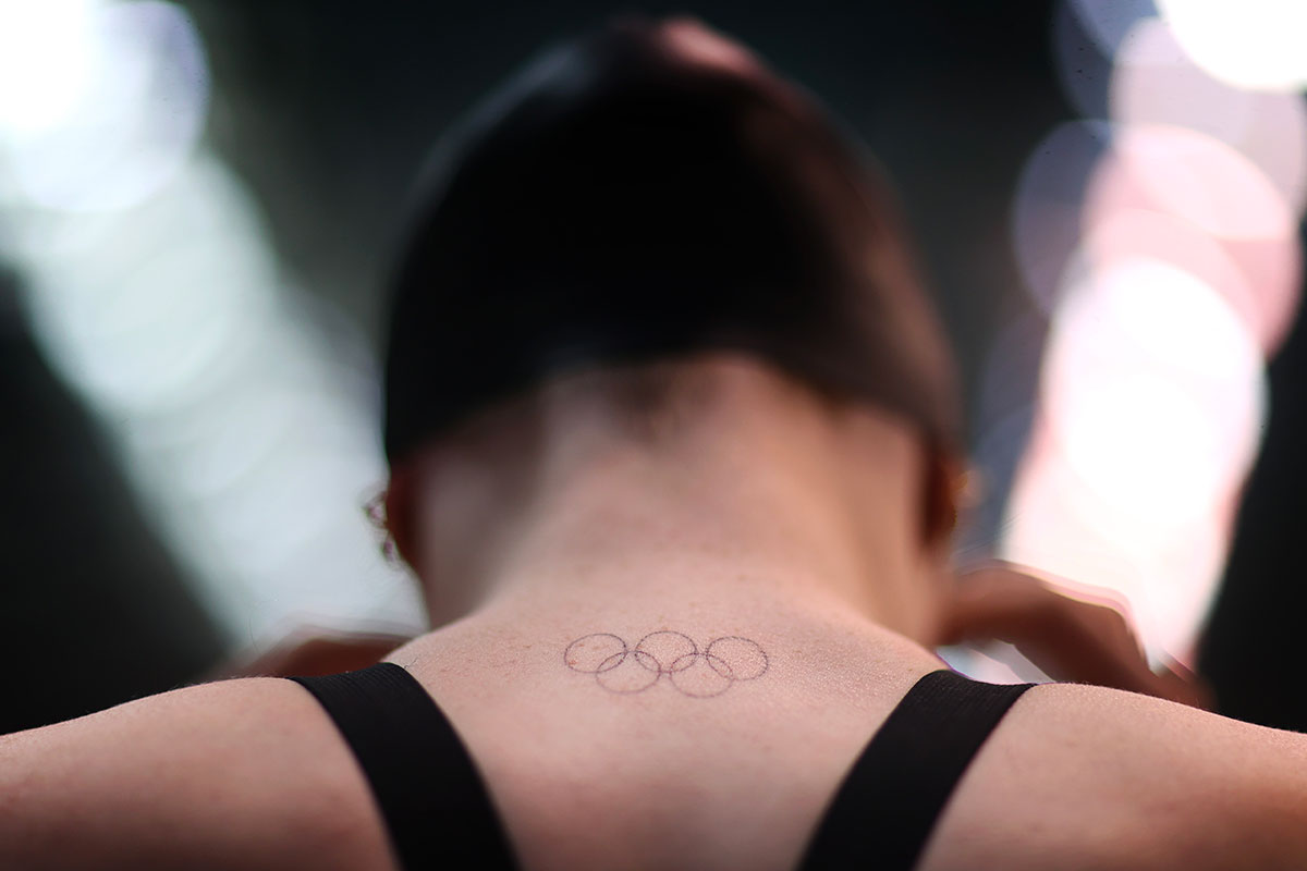 A detailed view of the Olympic rings tattooed onto the neck of Freya Anderson