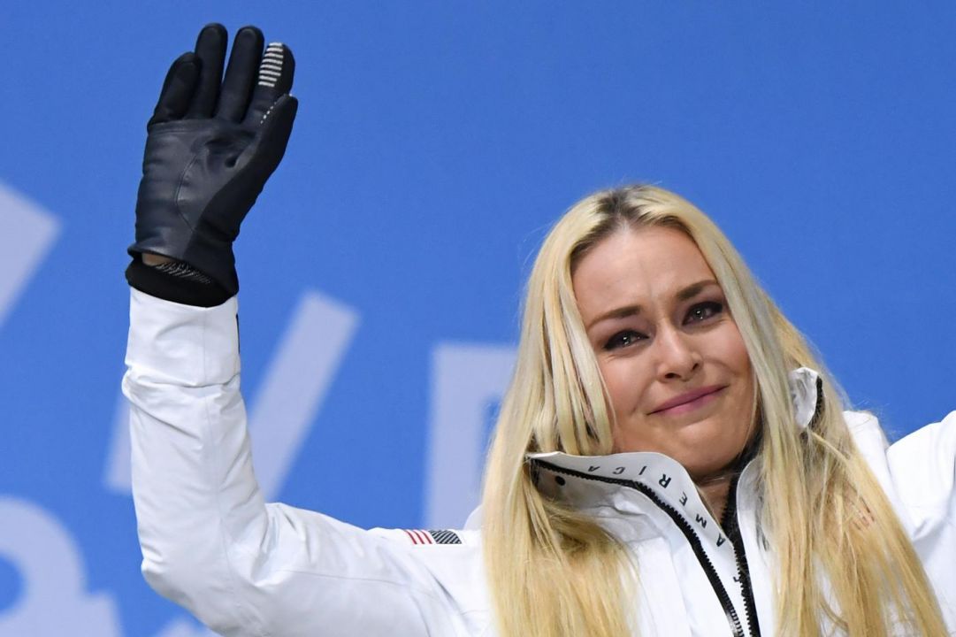 USA's bronze medallist Lindsey Vonn tears up on the podium during the medal ceremony for the alpine skiing Women's Downhill at the Pyeongchang Medals Plaza during the Pyeongchang 2018 Winter Olympic Games in Pyeongchang on February 21, 2018. / AFP PHOTO / JAVIER SORIANO